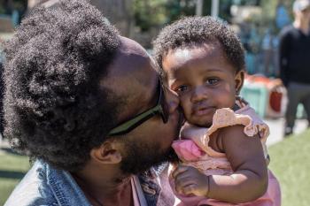 Man holding baby